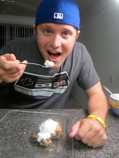 A man eating a scoop of ice cream. 