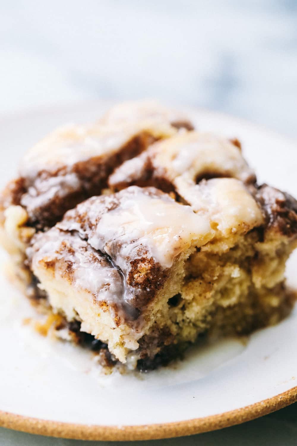 Closeup of a slice of cinnamon roll cake.