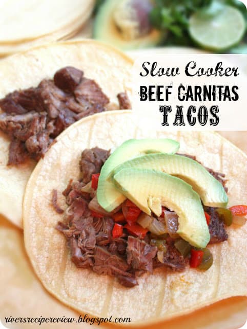 Slow cooker beef carnitas tacos with avocado slices. 