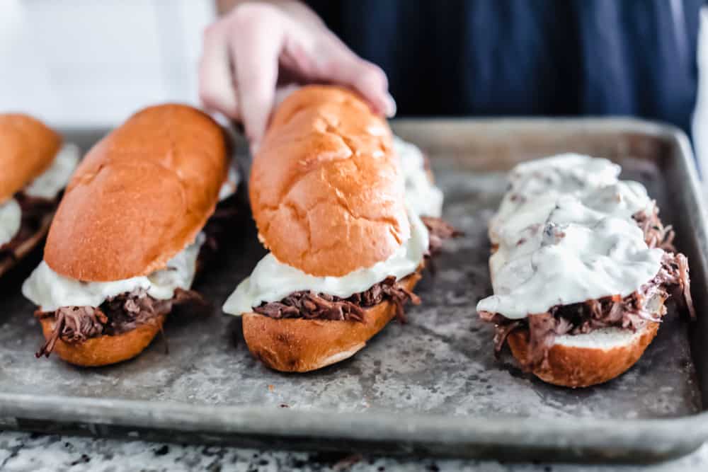 baking the slow cooker French dip sandwiches 