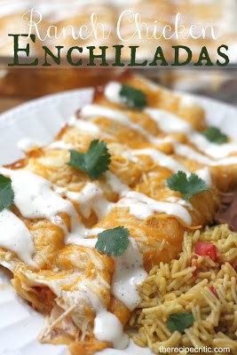 Ranch Chicken Enchiladas on a white plate with green garnish and a side of rice.