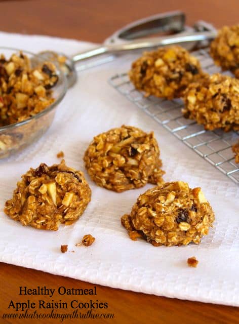 Healthy oatmeal apple raisin cookies on cooling sheet