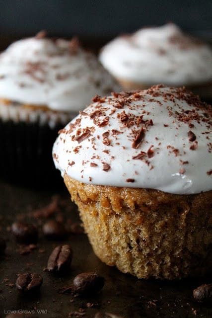 Cappuccino and Chocolate Cupcakes ready to eat with chocolate flakes on top.