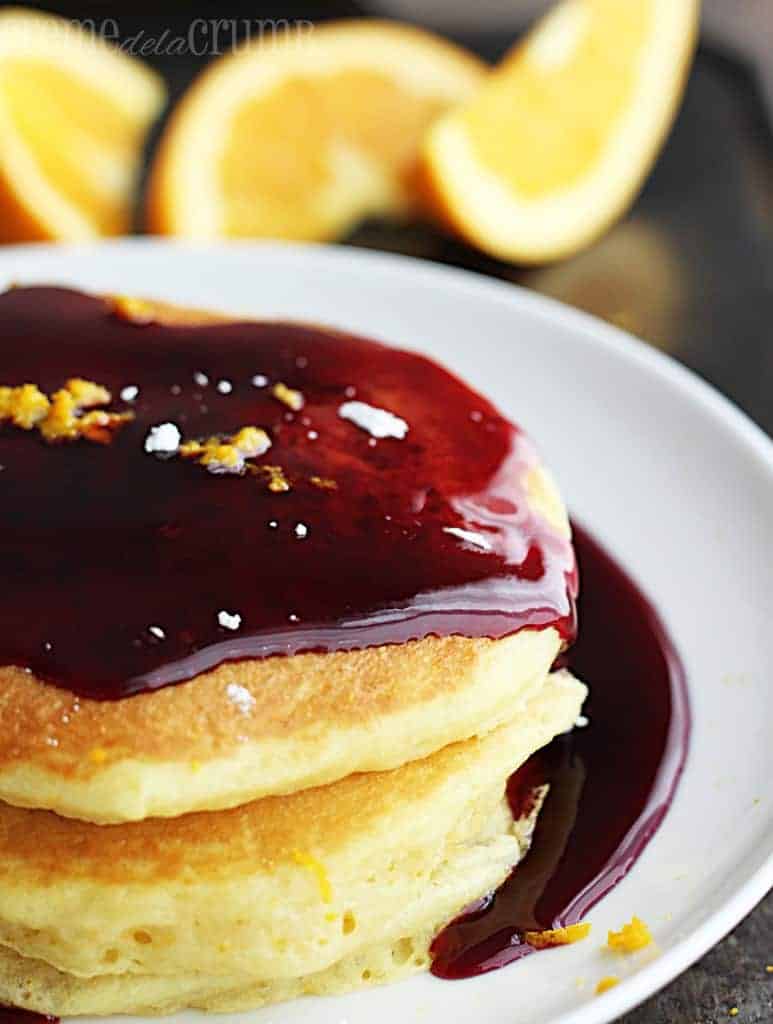 Orange Buttermilk Pancakes on a white plate.