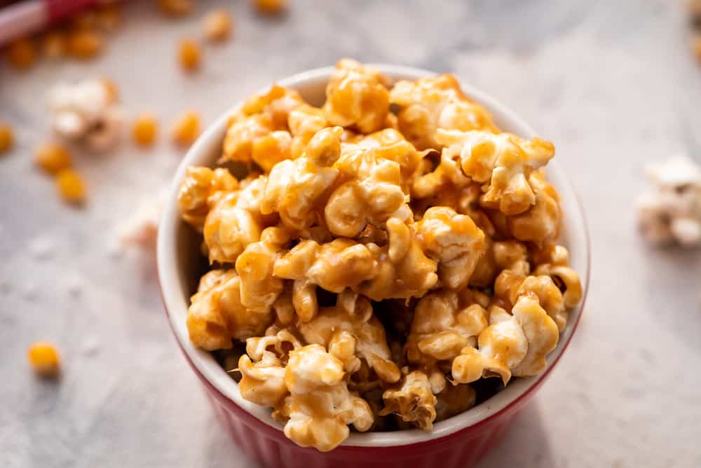 salted caramel popcorn in a red bowl