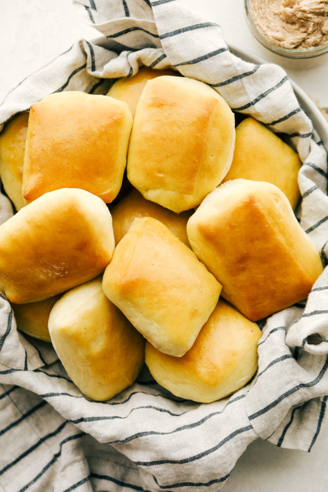 Fluffy soft Copycat Texas Roadhouse Rolls with Cinnamon Honey Butter.