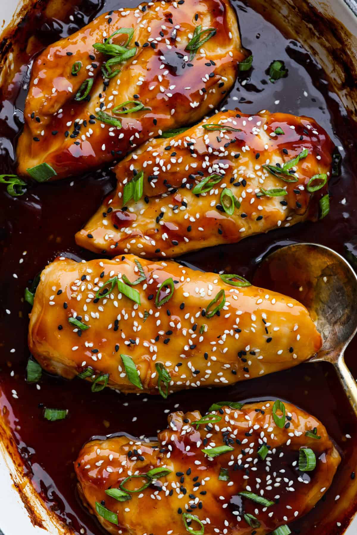 Close up shot of baked teriyaki chicken. 