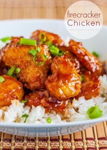 Firecracker Chicken over white rice in a white bowl. 