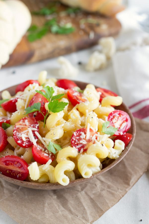 Zesty Tomato Pasta in a wooden bowl. 