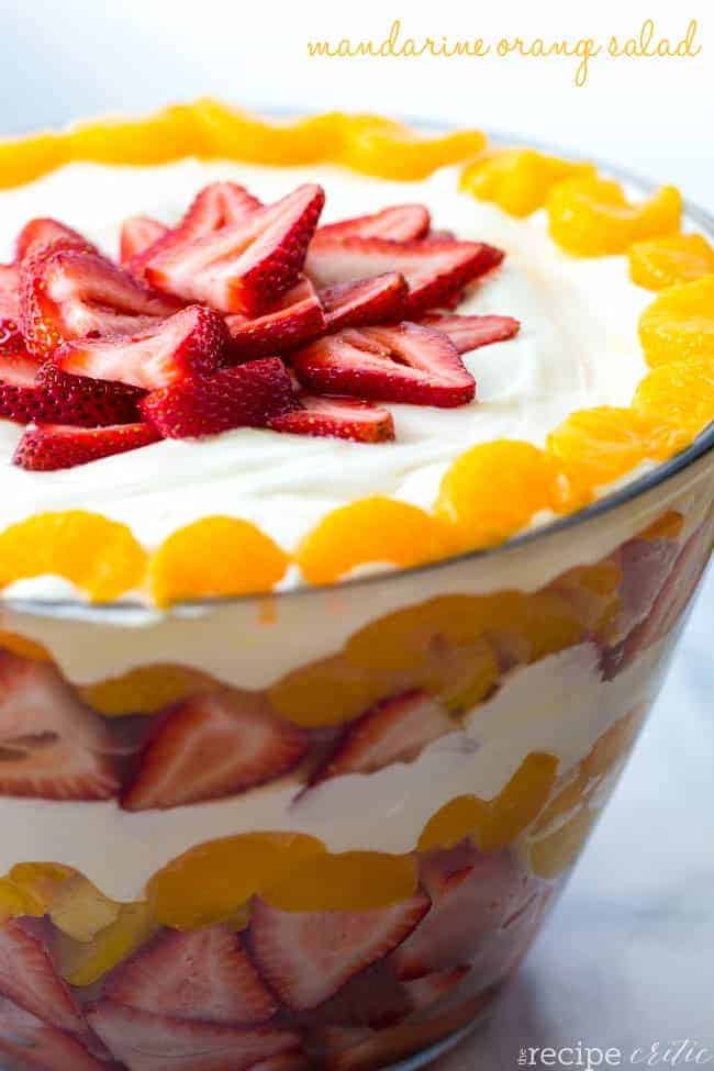 Mandarine salad in a large clear bowl. 