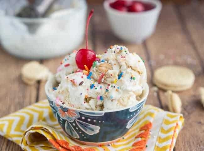 Golden oreo ice cream with a cherry on top. 