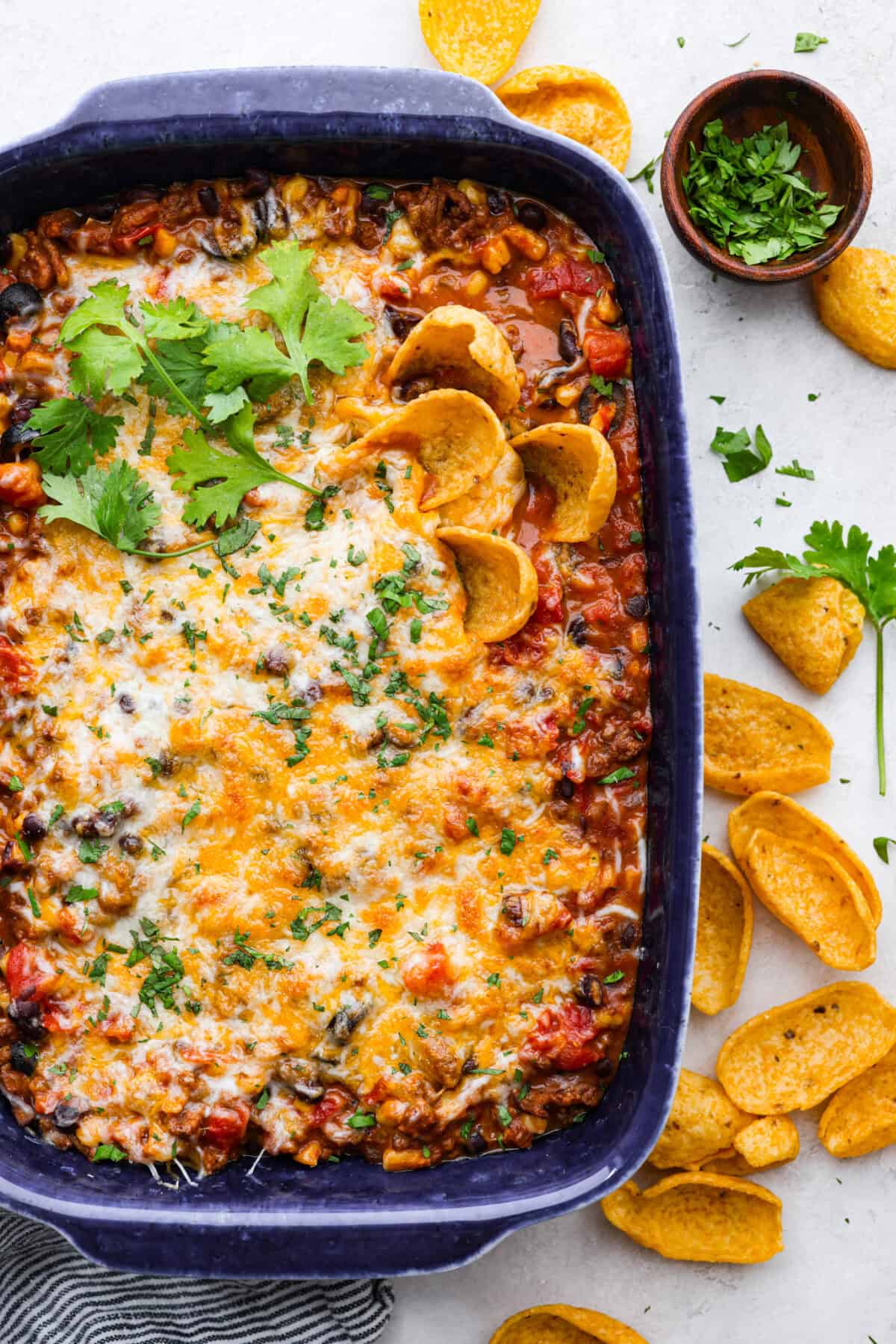 Overhead shot of beef enchilada dip in baking dish. 