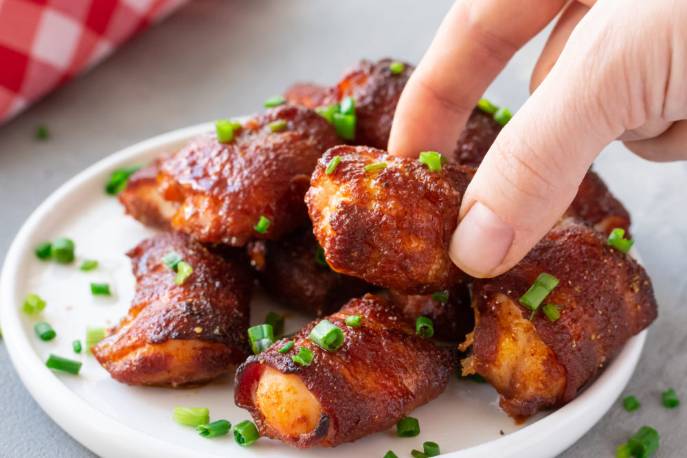 Chicken bites stacked on a top of each other. 