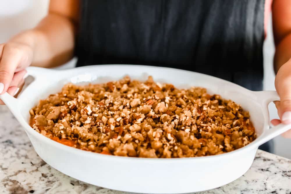 Brown sugar pecan mixture added to casserole.