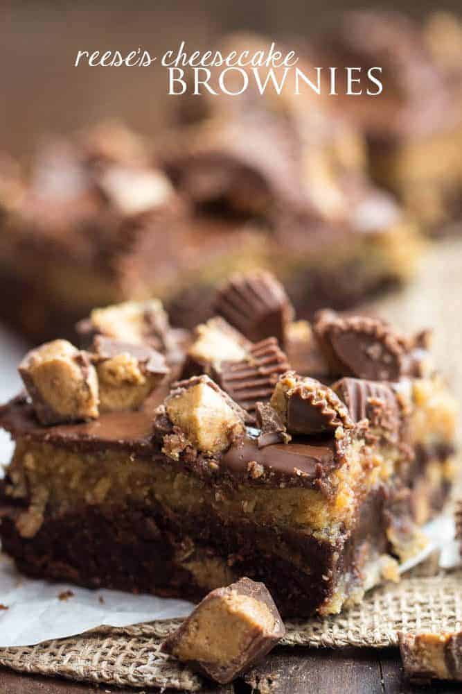 Reeses Cheesecake Brownies on a piece of parchment paper. 