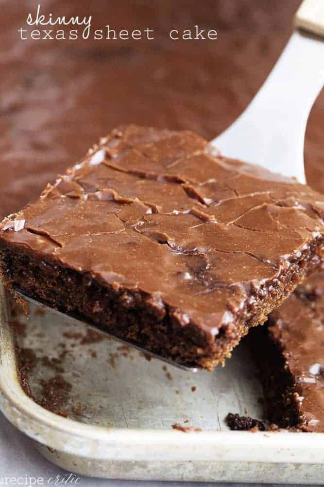 skinny texas sheet cake square on a spatula ready to serve.