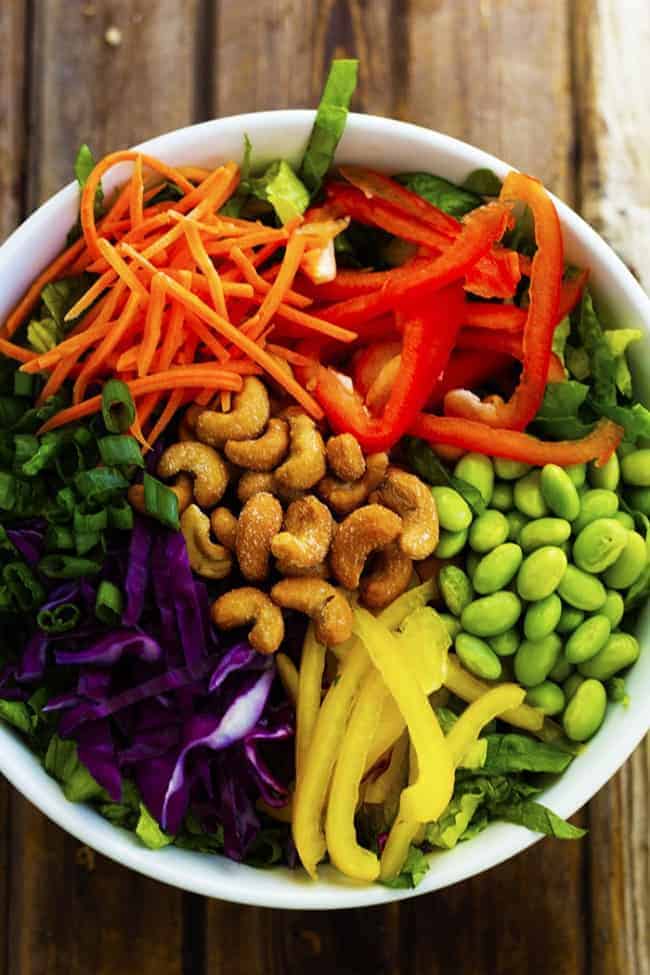 thai salad ingredients in a bowl ready to be mixed.