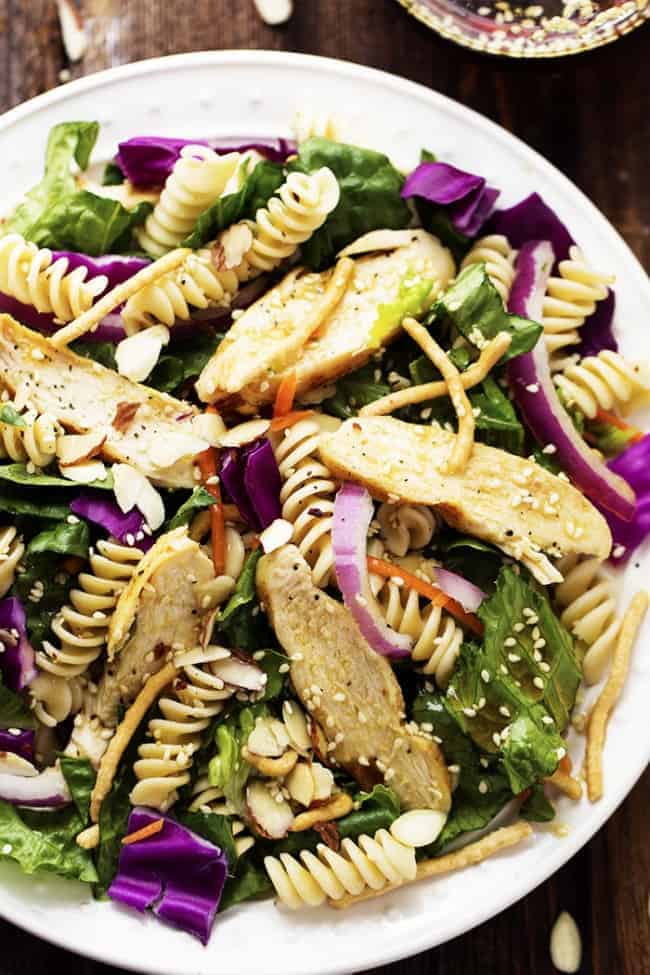 chinese chicken salad on a white plate.