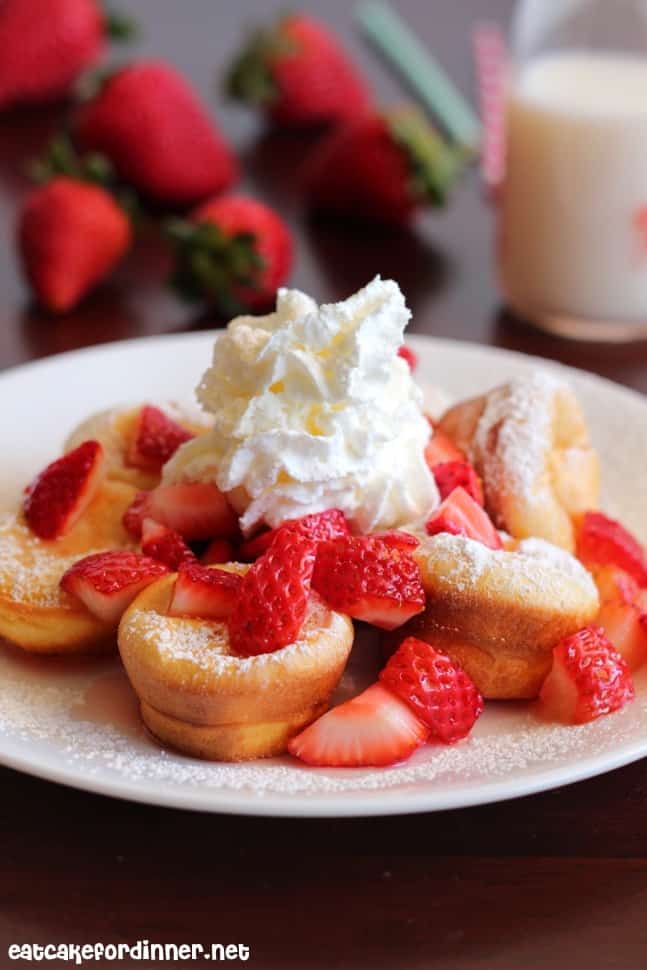 Mini Puffed Oven Pancakes on a white plate.