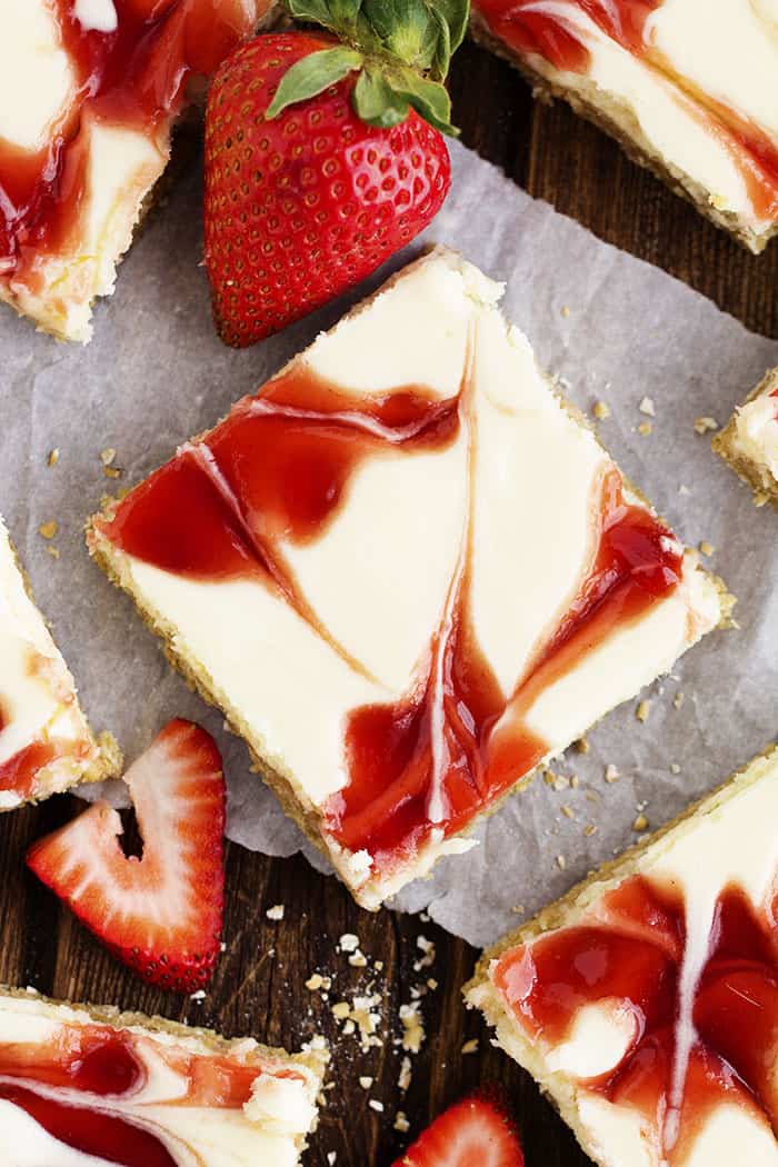 Ariel view of a strawberry swirl cheesecake bar.