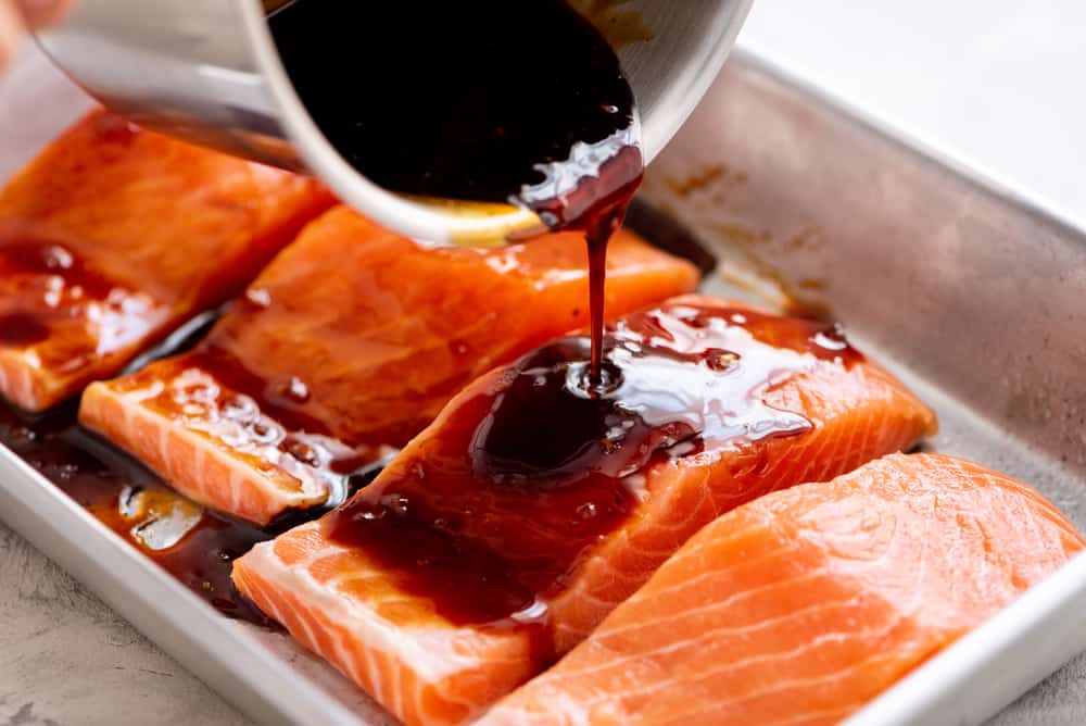 salmon with teriyaki sauce drizzled over it