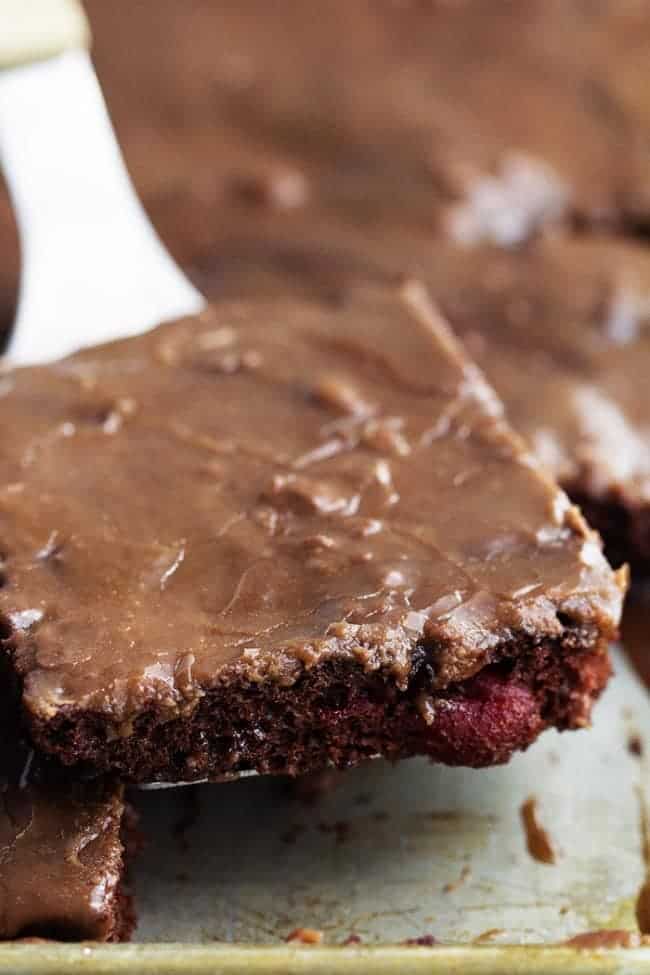 close up on a square of cherry chocolate sheet cake