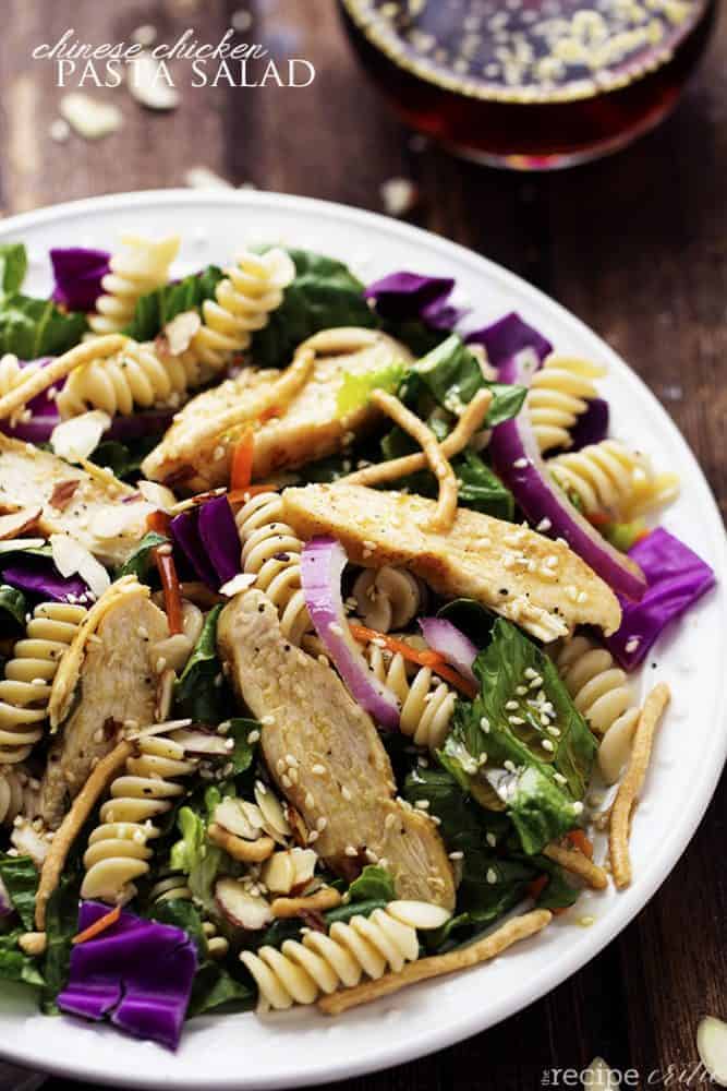 chinese chicken pasta salad on a white plate.