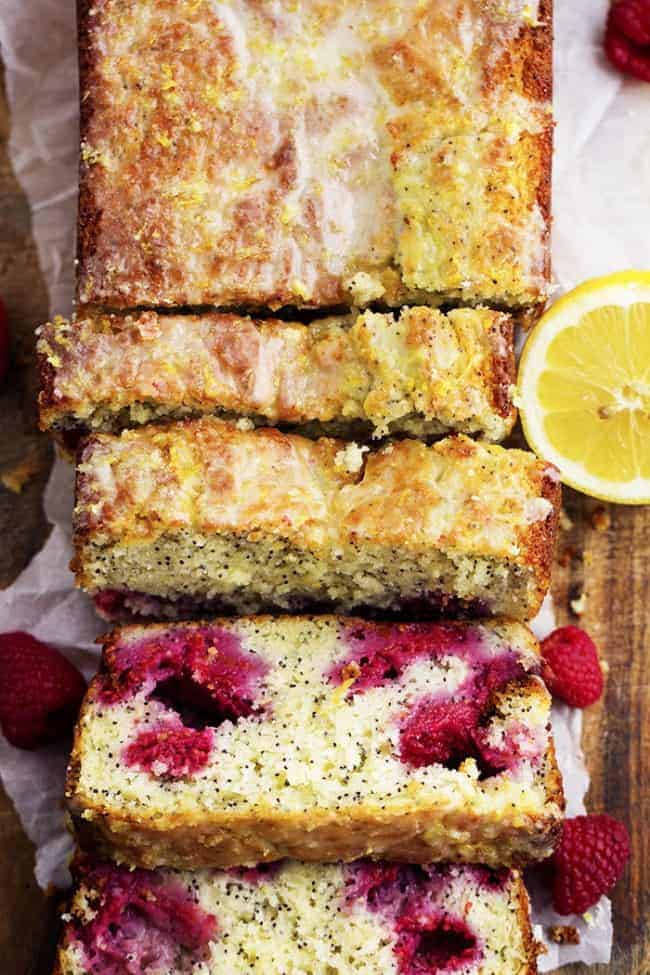 lemon raspberry bread loaf areal view with 3 pieces sliced.