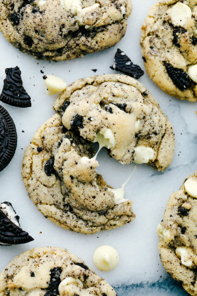 White chocolate oreo cookies split apart to see the melted white chocolate. 