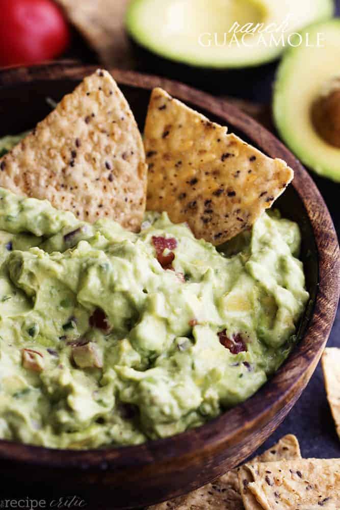 ranch guacamole in a bowl with 2 tortilla chips