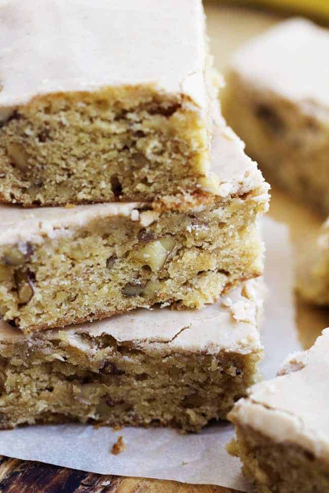 Close up side view of banana nut blondies in a stack.