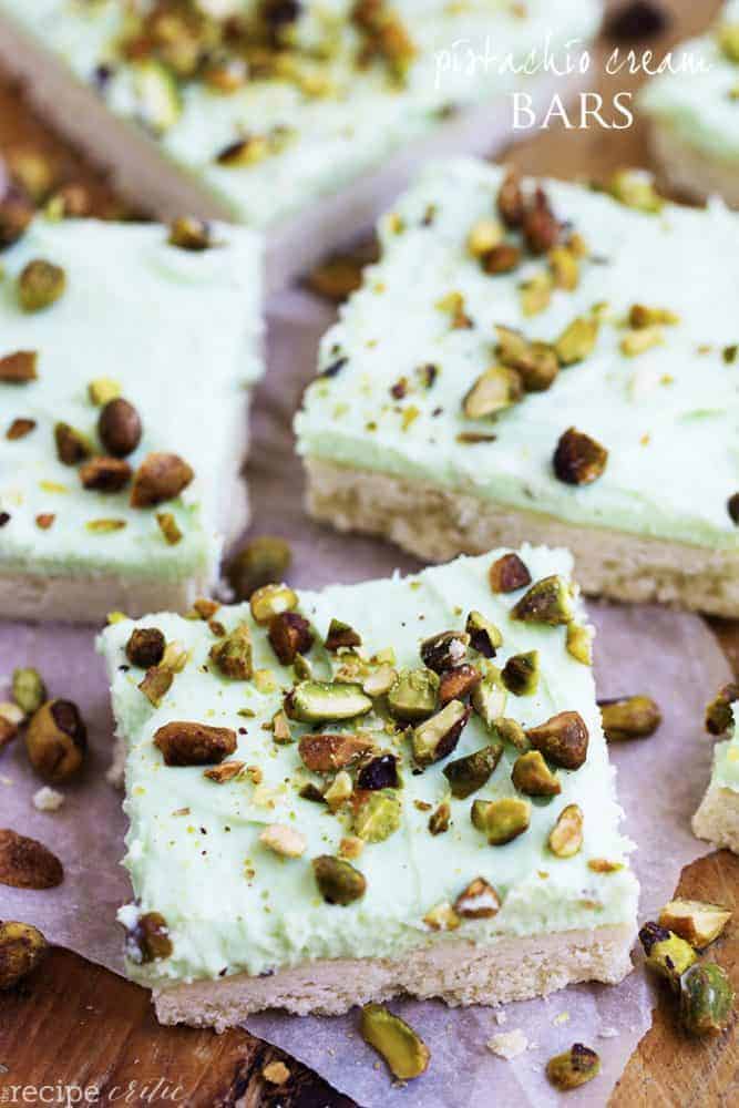 pistachio cream bars with crushed pistachio garnish.