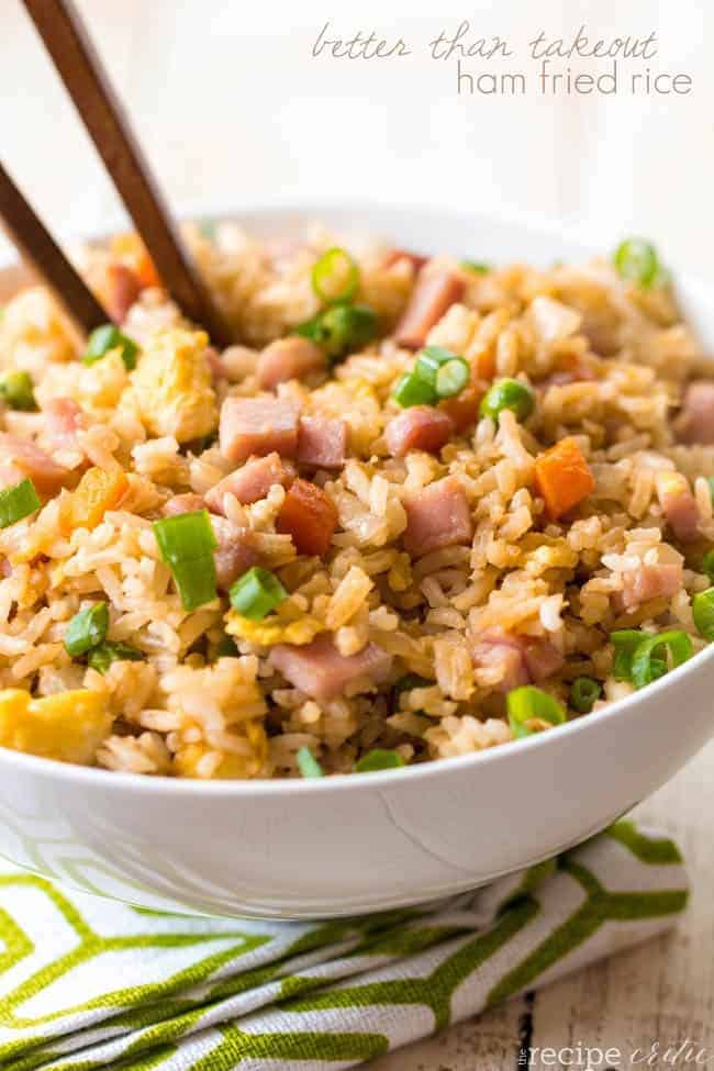 Better than takeout ham fried rice in a white bowl.