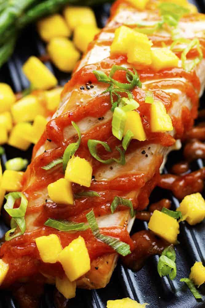 mango chipotle salmon on a tray.