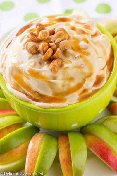 Caramel Cheesecake Dip in a green bowl.