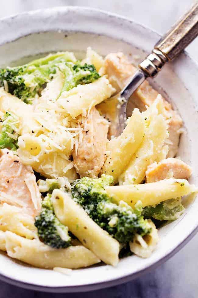 Three cheese chicken broccoli alfredo in a white bowl.