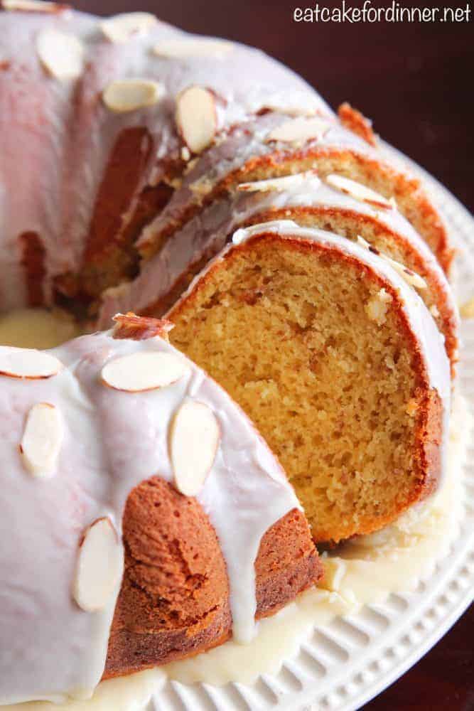 Banana Pudding Cake sliced on a white plate.