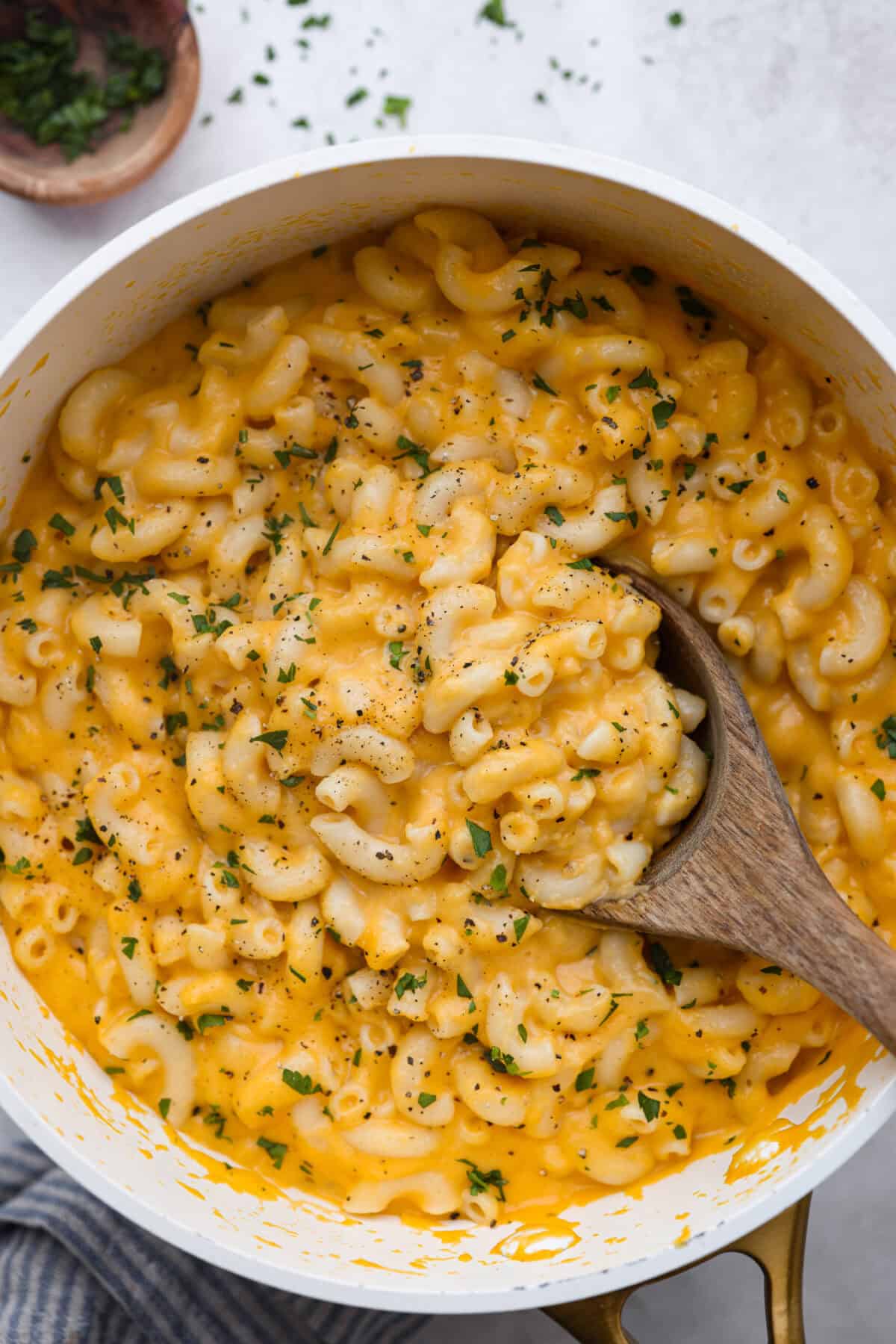 Over head shot of cheesy butternut squash pasta in a pot. 