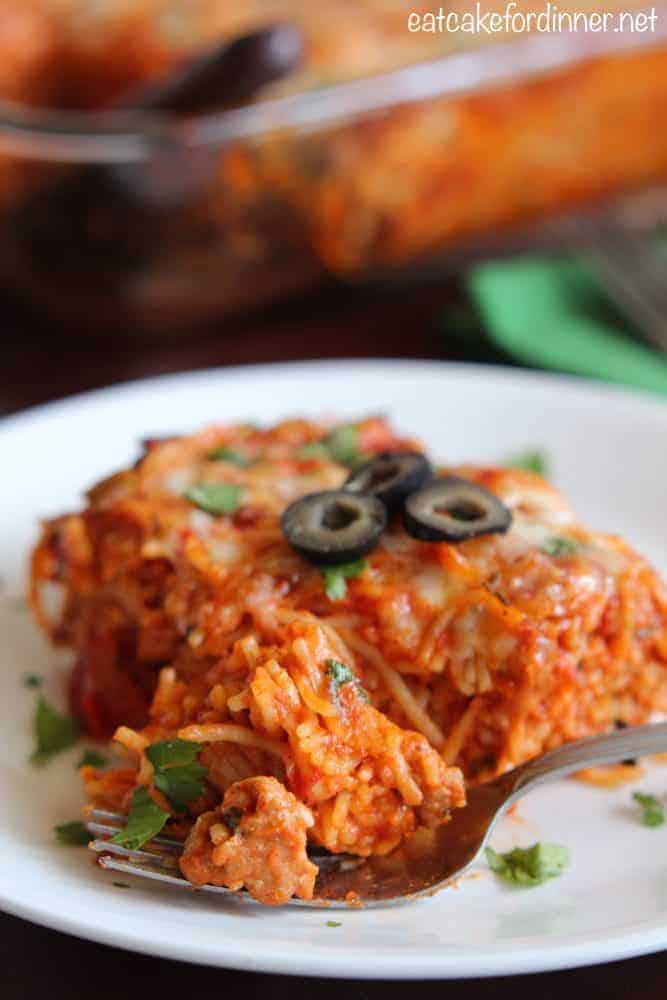 baked tex mex spaghetti on a white plate.