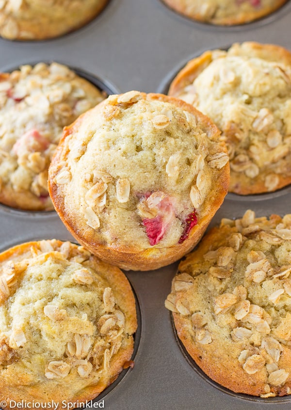 Strawberry Banana Oat Muffins in a muffin tin.  