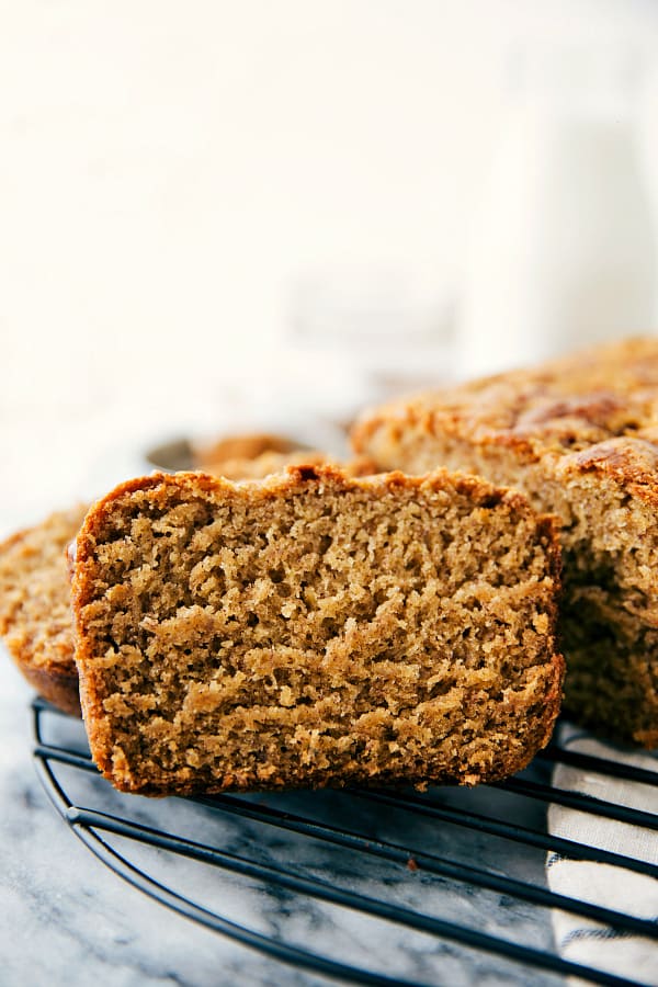 Banana cake slice on a cooling rack.  