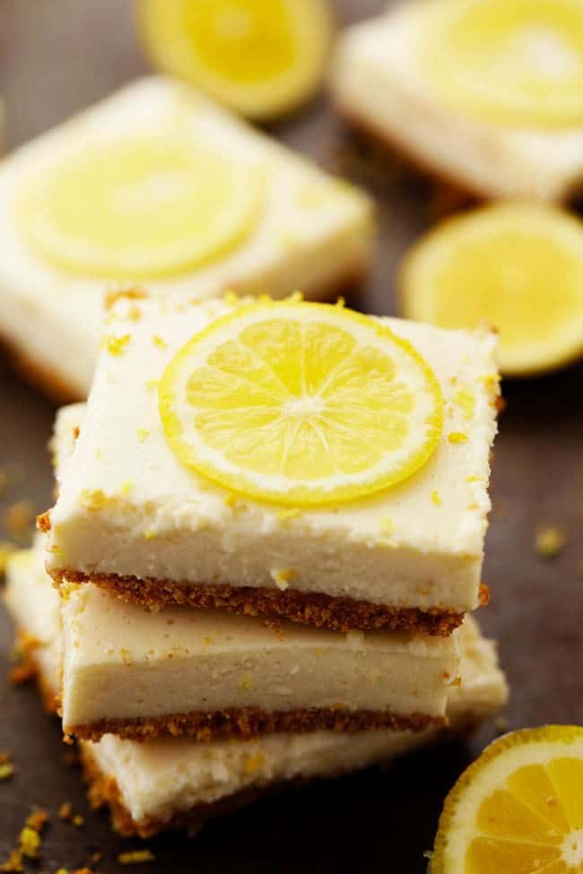 Lemon icebox bars with lemon slices on top.