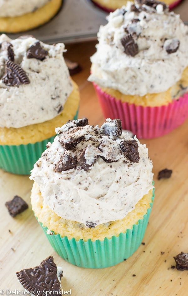 Cookies and Cream Cupcakes on a wooden table. 