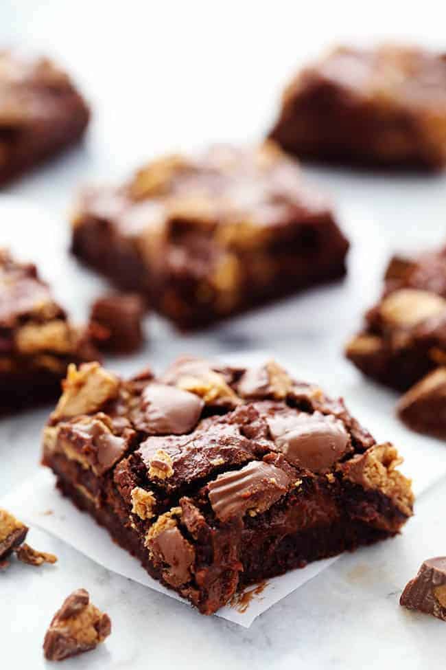 Close up photo of Hot Fudge Peanut Butter Cup Cheesecake Brownies.