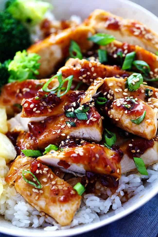 Teriyaki chicken with broccoli and onion over rice.