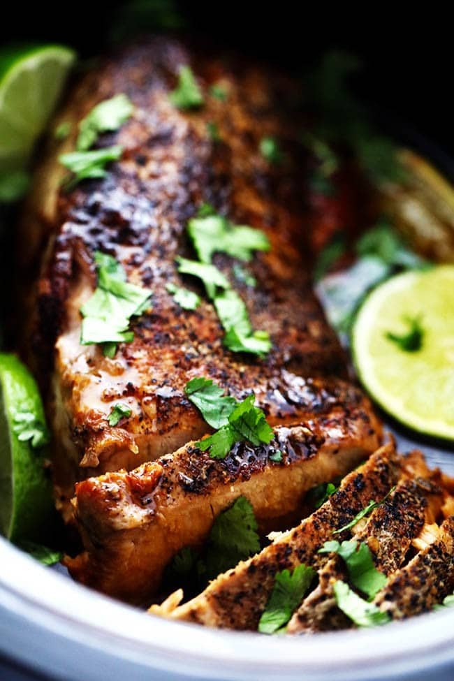 Close up photo of slow cooker honey lime ginger pork in a dish.