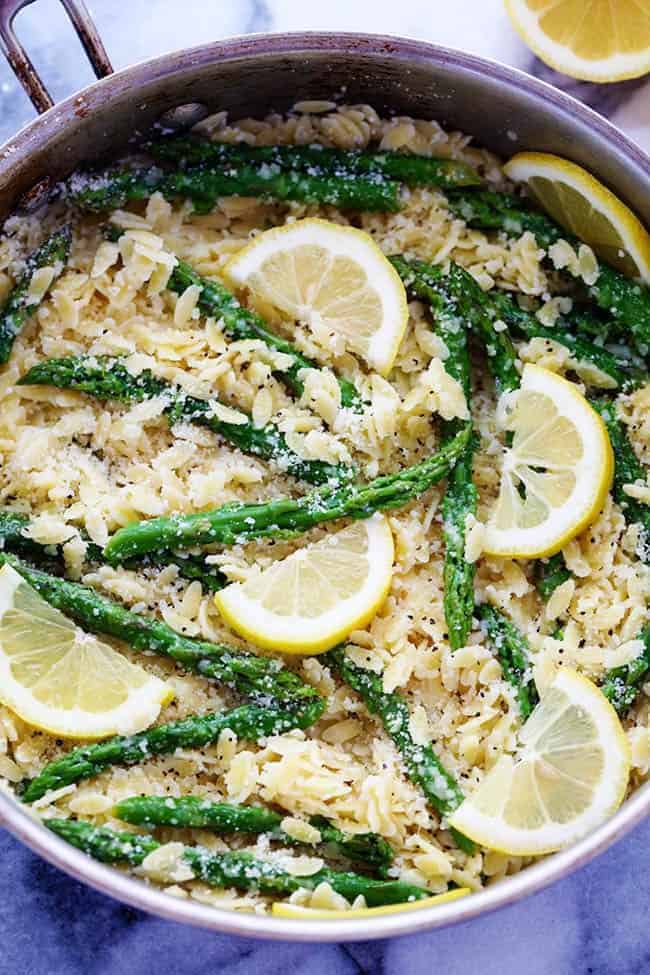 Lemon Parmesan Garlic Orzo with Asparagus in a metal pot. 