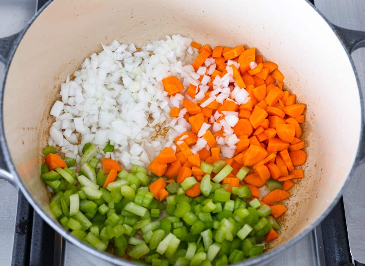 Second photo of the veggies added to a large pot.