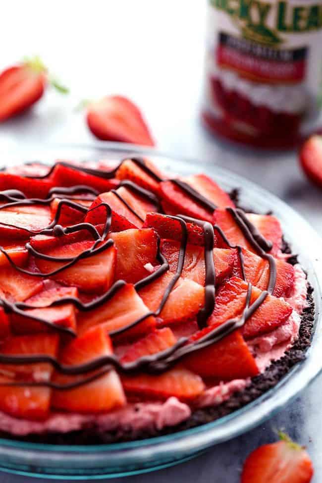 No Bake Chocolate Strawberries and Cream Pie in a clear pie dish. 