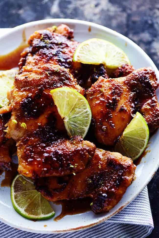 Skillet honey lime chicken on a white plate. 